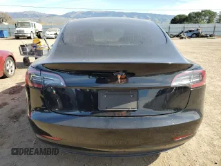 2019 Tesla Model 3 Mid Range with VIN 5YJ3E1EAXKF311719, listed as a Copart auction lot 44570825 with 143,034 mi miles and Salvage Title. Bid and sale history available at carsss.com. Image 6.