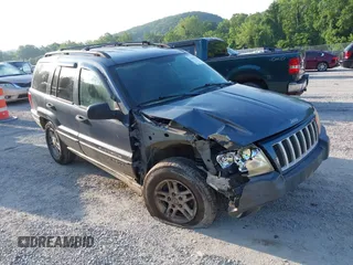 2004 Jeep Grand Cherokee Laredo z VIN 1J4GW48S44C394854, wystawiony jako IAAI lot #42550109 z przebiegiem 224 477 mil mil oraz . Historia ofert i sprzedaży dostępna na DreamBid. Obrazek 1.