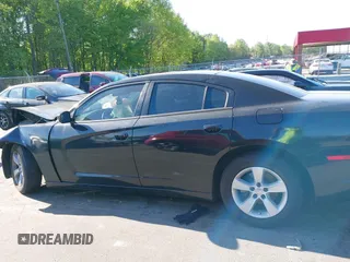 2012 Dodge Charger SE with VIN 2C3CDXBG7CH259867, listed as a IAAI auction lot 42046084 with 240,558 mi miles and . Bid and sale history available at DreamBid. Image 13.