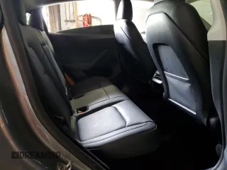 2024 Tesla Model Y Long Range with VIN 7SAYGDEE2RA299824, listed as a Copart auction lot 56040835 with 16,534 mi miles and Salvage title. Bid and sale history available at DreamBid. Image 11.