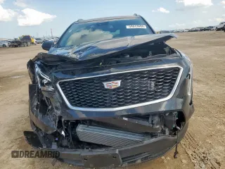 2020 Cadillac XT4 FWD Sport with VIN 1GYFZER45LF146781, listed as a Copart auction lot 59043685 with 65,177 mi miles and Salvage title. Bid and sale history available at DreamBid. Image 5.