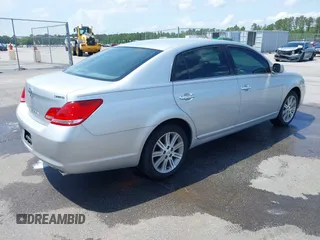 2006 Toyota Avalon XL with VIN 4T1BK36B26U167325, listed as a IAAI auction lot 42090660 with 196,932 mi miles. Bid and sale history available at carsss.com. Image 4.