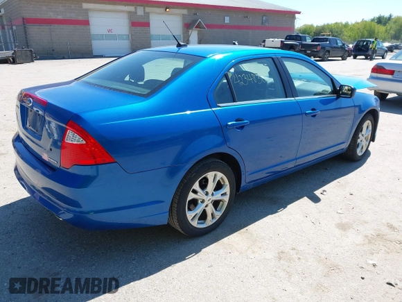 2012 Ford Fusion SE z VIN 3FAHP0HG4CR276627, wystawiony jako IAAI lot #42348303 z przebiegiem 160 922 mil mil oraz . Historia ofert i sprzedaży dostępna na DreamBid. Obrazek 4.