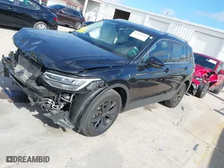 2023 Volkswagen Tiguan SE with VIN 3VV3B7AX9PM062632, listed as a IAAI auction lot 41943020 with 40,995 mi miles. Bid and sale history available at carsss.com. Image 2.