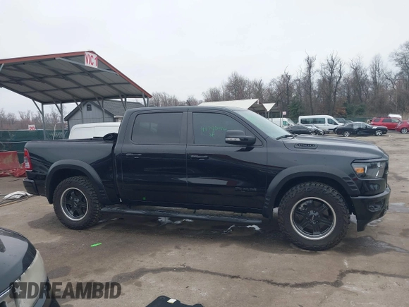 2022 Ram 1500 Big Horn with VIN 1C6SRFFT3NN287385, listed as a IAAI auction lot 41793596 with 12,277 mi miles and . Bid and sale history available at DreamBid. Image 14.