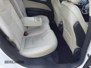 2016 Ford Fusion Titanium with VIN 3FA6P0K96GR400436, listed as a IAAI auction lot 42191256 with 128,447 mi miles and . Bid and sale history available at DreamBid. Image 8.