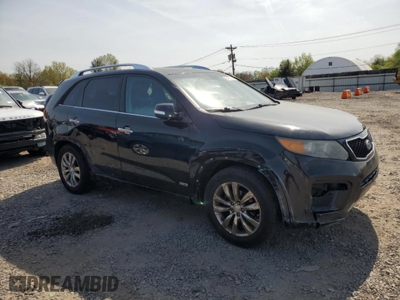 2012 Kia Sorento SX with VIN 5XYKWDA24CG231819, listed as a Copart auction lot 54662245 with 186,149 mi miles and Clean Title. Bid and sale history available at carsss.com. Image 4.