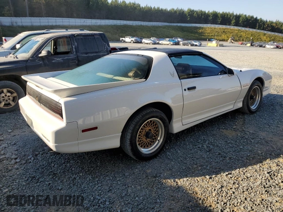 1988 Pontiac Firebird z VIN 1G2FW2183JL204840, wystawiony jako Copart lot #69142254 z przebiegiem 62 529 mil mil oraz Czysty tytuł • Clean title. Historia ofert i sprzedaży dostępna na DreamBid. Obrazek 3.