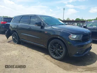 2014 Dodge Durango R/T z VIN 1C4SDJCT4EC331680, wystawiony jako IAAI lot #42296689 z przebiegiem 172 128 mil mil oraz . Historia ofert i sprzedaży dostępna na DreamBid. Obrazek 1.