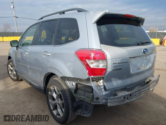 2016 Subaru Forester 2.5i Touring with VIN JF2SJAXCXGH522837, listed as a IAAI auction lot 41562541 with 106,720 mi miles. Bid and sale history available at carsss.com. Image 3.