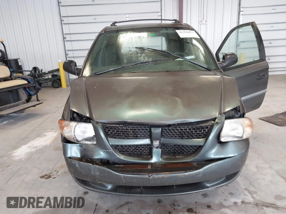 2003 Dodge Caravan SE with VIN 1D4GP24313B191319, listed as a IAAI auction lot 41398477 with 220,083 mi miles. Bid and sale history available at carsss.com. Image 12.