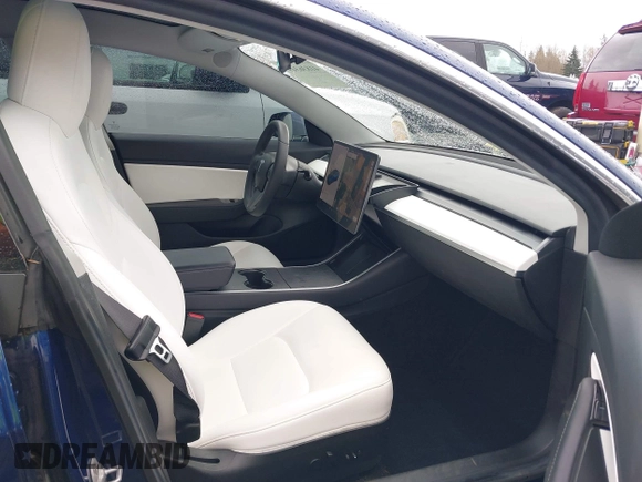 2019 Tesla Model 3 Long Range with VIN 5YJ3E1EB8KF512950, listed as a IAAI auction lot 41836349 with 55,607 mi miles and . Bid and sale history available at DreamBid. Image 5.