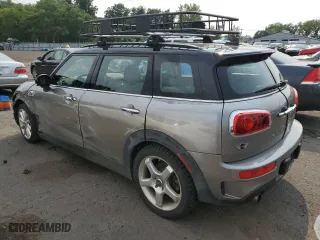 2017 MINI Clubman Cooper S with VIN WMWLU5C55H2F24329, listed as a Copart auction lot 67163314 with 129,818 mi miles and Salvage Title. Bid and sale history available at carsss.com. Image 2.