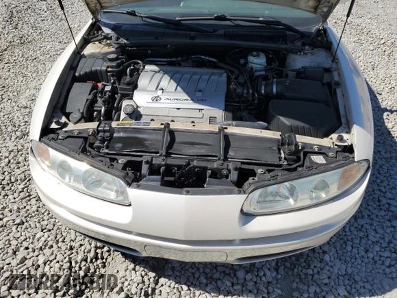 2003 Oldsmobile Aurora z VIN 1G3GS64CX34163493, wystawiony jako Copart lot #75863314 z przebiegiem 211 607 mil mil oraz Szkody całkowita. Historia ofert i sprzedaży dostępna na DreamBid. Obrazek 11.