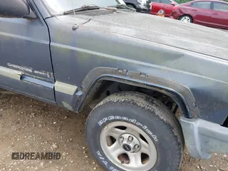 2001 Jeep Cherokee with VIN 1J4FT47S11L609530, listed as a IAAI auction lot 42222446 with 156,408 mi miles and . Bid and sale history available at DreamBid. Image 6.
