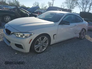 2016 BMW 4 Series 428i with VIN WBA3N7C58GK225681, listed as a Copart auction lot 87835985 with 67,683 mi miles and Salvage Title. Bid and sale history available at carsss.com. Image 1.