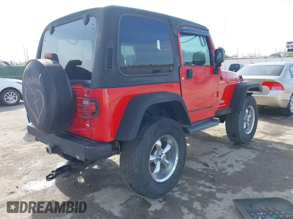 2004 Jeep Wrangler Sport with VIN 1J4FA49S54P744171, listed as a IAAI auction lot 41974657 with 173,230 mi miles. Bid and sale history available at carsss.com. Image 4.