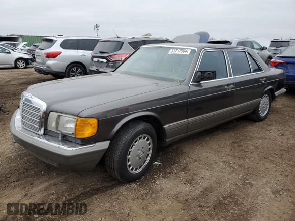 1987 Mercedes-Benz 560 with VIN WDBCA39D7HA322057, listed as a Copart auction lot 83717904 with 246,060 mi miles and Clean Title. Bid and sale history available at DreamBid. Image 1.