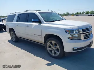 2020 Chevrolet Suburban Premier with VIN 1GNSCJKCXLR263570, listed as a IAAI auction lot 41980013 with 1 mi miles. Bid and sale history available at carsss.com. Image 1.