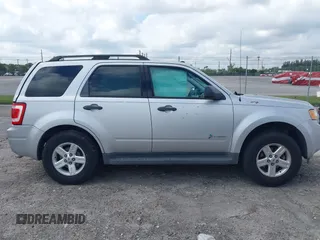 2011 Ford Escape Hybrid with VIN 1FMCU4K3XBKC60103, listed as a IAAI auction lot 42048614 with 125,354 mi miles and . Bid and sale history available at DreamBid. Image 13.