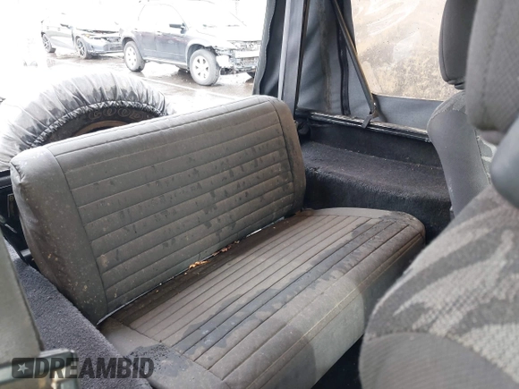 1995 Jeep Wrangler S with VIN 1J4FY19P0SP258399, listed as a IAAI auction lot 41970320 with 151,621 mi miles. Bid and sale history available at carsss.com. Image 8.
