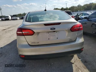 2018 Ford Focus SE z VIN 1FADP3FE8JL331853, wystawiony jako Copart lot #74013984 z przebiegiem 73 237 mil mil oraz Szkoda całkowita • Salvage title. Historia ofert i sprzedaży dostępna na DreamBid. Obrazek 6.