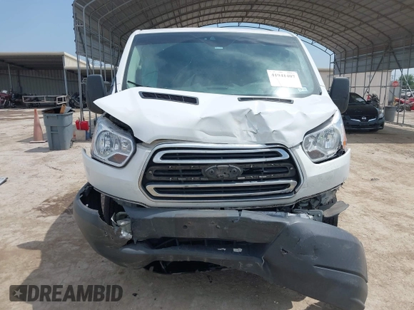 2018 Ford Transit with VIN 1FTYR1YM1JKA98581, listed as a IAAI auction lot 41941407 with 98,543 mi miles and . Bid and sale history available at carsss.com. Image 13.