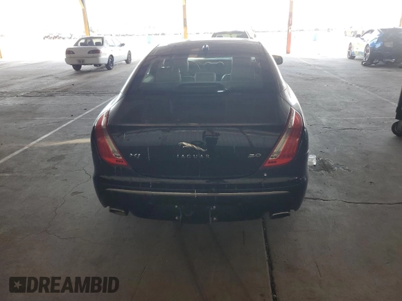2013 Jaguar XJ z VIN SAJWA1C77D8V40055, wystawiony jako Copart lot #60461395 z przebiegiem 102 709 mil mil oraz Czysty tytuł • Clean title. Historia ofert i sprzedaży dostępna na DreamBid. Obrazek 6.