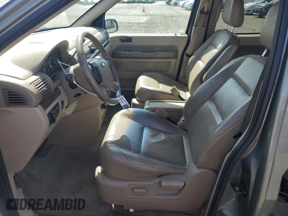 2004 Ford Freestar SEL z VIN 2FMDA522X4BA41942, wystawiony jako Copart lot #54007555 z przebiegiem 119 877 mil mil oraz Szkoda całkowita • Salvage title. Historia ofert i sprzedaży dostępna na DreamBid. Obrazek 7.
