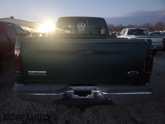 1999 Ford F-350 XL with VIN 1FTSF31L1XEA83209, listed as a Copart auction lot 81034374 with 151,361 mi miles and Salvage Title. Bid and sale history available at DreamBid. Image 6.