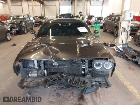2015 Dodge Challenger R/T with VIN 2C3CDZAT5FH794310, listed as a IAAI auction lot 41725179 with 84,961 mi miles and . Bid and sale history available at DreamBid. Image 13.