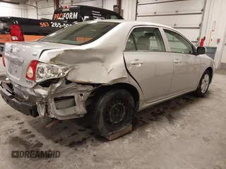 2009 Toyota Corolla with VIN 1NXBU40E69Z129314, listed as a IAAI auction lot 41718098 with 170,739 mi miles. Bid and sale history available at carsss.com. Image 4.