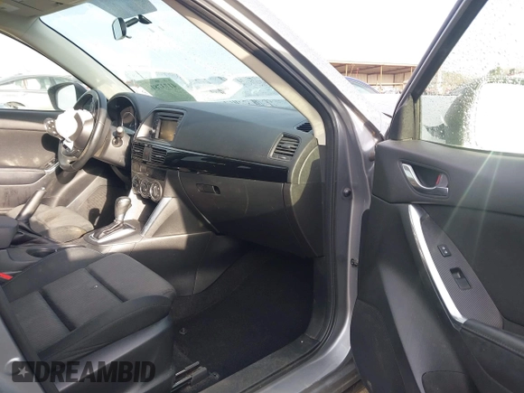 2015 Mazda CX-5 Touring with VIN JM3KE2CYXF0435583, listed as a IAAI auction lot 41737810 with 107,270 mi miles and . Bid and sale history available at DreamBid. Image 5.
