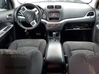 2013 Dodge Journey American Value with VIN 3C4PDCAB7DT500878, listed as a Copart auction lot 58397655 with 183,755 mi miles and Salvage title. Bid and sale history available at DreamBid. Image 8.