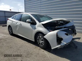 2020 Toyota Prius LE z VIN JTDKARFP5L3158691, wystawiony jako Copart lot #55255125 z przebiegiem Nie podano mil oraz Szkoda całkowita • Salvage title. Historia ofert i sprzedaży dostępna na DreamBid. Obrazek 4.
