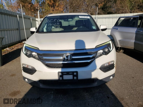 2016 Honda Pilot EX-L with VIN 5FNYF5H70GB024908, listed as a Copart auction lot 43238705 with 156,412 mi miles and Salvage Title. Bid and sale history available at DreamBid. Image 5.