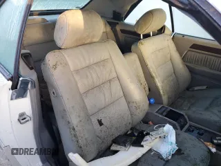 1995 Mercedes-Benz E Class with VIN WDBEA66E0SC275229, listed as a Copart auction lot 77391894 with 64,025 mi miles and Salvage Title. Bid and sale history available at carsss.com. Image 10.