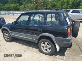 1997 Toyota RAV4 with VIN JT3HP10V3V7059398, listed as a Copart auction lot 54709995 with 186,467 mi miles and Salvage title. Bid and sale history available at DreamBid. Image 2.