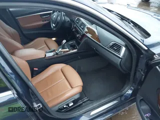 2017 BMW 3 Series 330i xDrive with VIN WBA8D9G55HNU60442, listed as a IAAI auction lot 41039727 with 99,350 mi miles. Bid and sale history available at carsss.com. Image 5.