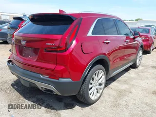 2019 Cadillac XT4 FWD Premium Luxury with VIN 1GYFZCR49KF207634, listed as a IAAI auction lot 42256021 with 67,481 mi miles and . Bid and sale history available at DreamBid. Image 4.