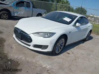 2016 Tesla Model S 70 kWh Battery with VIN 5YJSA1E16GF129997, listed as a IAAI auction lot 42108270 with 1 mi miles. Bid and sale history available at carsss.com. Image 2.