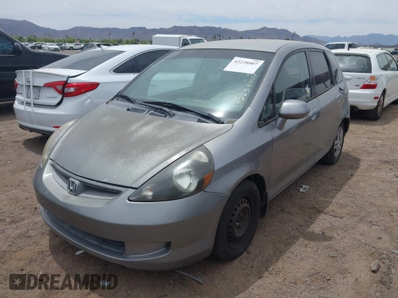2007 Honda Fit z VIN JHMGD38467S063046, wystawiony jako IAAI lot #42238007 z przebiegiem 171 743 mil mil oraz . Historia ofert i sprzedaży dostępna na DreamBid. Obrazek 6.