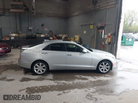 2016 Cadillac ATS Standard AWD z VIN 1G6AG5RX6G0149829, wystawiony jako IAAI lot #42165534 z przebiegiem 40 996 mil mil oraz . Historia ofert i sprzedaży dostępna na DreamBid. Obrazek 13.