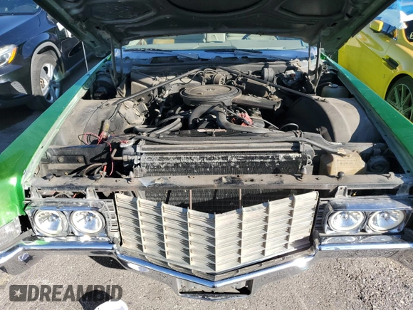 1969 Cadillac Brougham z VIN P9173311, wystawiony jako Copart lot #77826624 z przebiegiem 32 340 mil mil oraz Szkody całkowita. Historia ofert i sprzedaży dostępna na DreamBid. Obrazek 11.