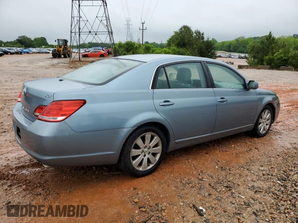 2005 Toyota Avalon XL z VIN 4T1BK36B65U041287, wystawiony jako Copart lot #56566535 z przebiegiem 223 562 mil mil oraz Szkoda całkowita • Salvage title. Historia ofert i sprzedaży dostępna na DreamBid. Obrazek 3.