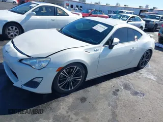 2015 Scion FR-S with VIN JF1ZNAA12F9709707, listed as a IAAI auction lot 41545940 with 107,575 mi miles. Bid and sale history available at carsss.com. Image 17.