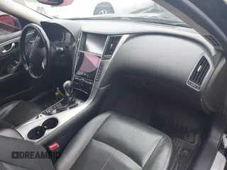 2014 Infiniti Q50 Premium z VIN JN1BV7AR4EM695232, wystawiony jako IAAI lot #42367581 z przebiegiem 138 063 mil mil oraz . Historia ofert i sprzedaży dostępna na DreamBid. Obrazek 5.