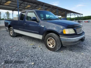 2002 Ford F-150 XL with VIN 1FTRX17232NB20820, listed as a Copart auction lot 55062355 with 231,726 mi miles and Salvage title. Bid and sale history available at DreamBid. Image 4.