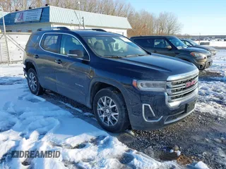 2021 GMC Acadia SLT with VIN 1GKKNMLS9MZ221021, listed as a IAAI auction lot 41614946 with 44,096 mi miles. Bid and sale history available at carsss.com. Image 1.
