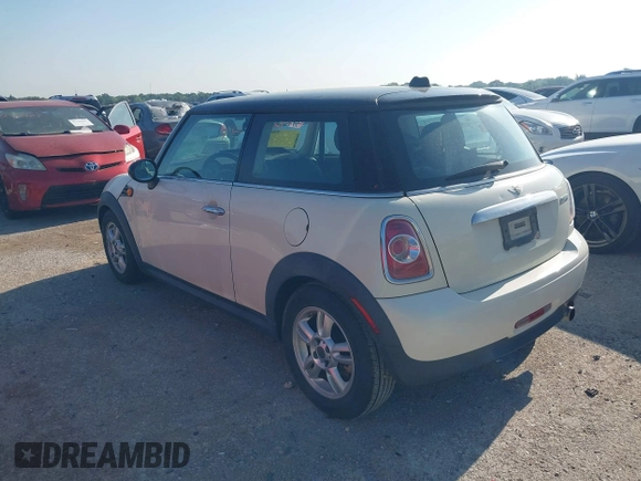 2013 MINI Hardtop with VIN WMWSU3C56DT681952, listed as a IAAI auction lot 42325521 with 124,405 mi miles and . Bid and sale history available at DreamBid. Image 3.